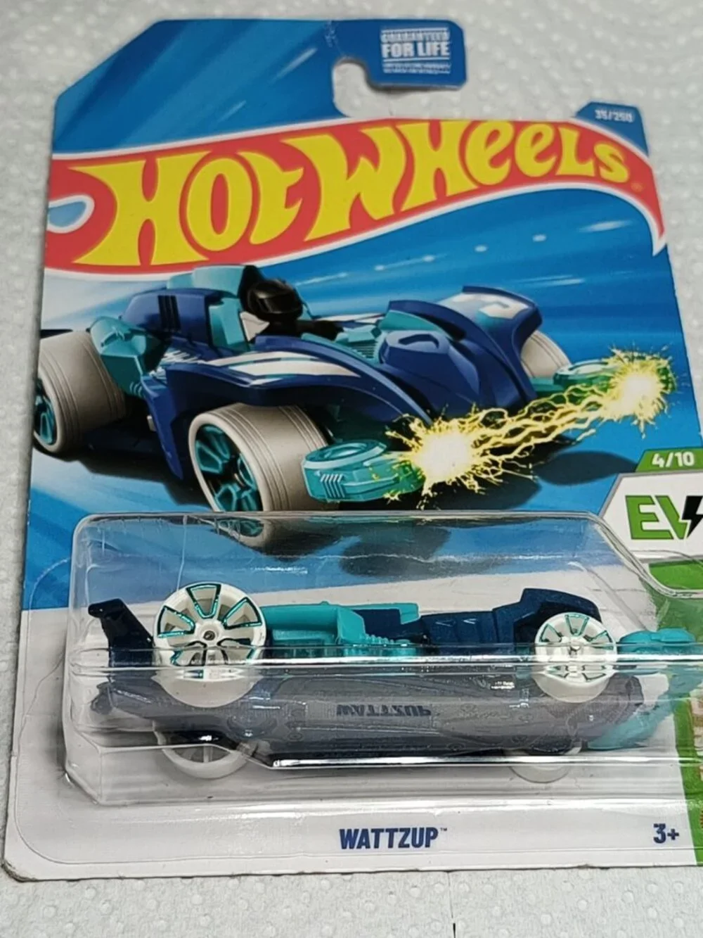 Factory-sealed 2026 Hot Wheels Wattzup with a possible factory wheel error.